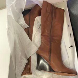Never worn. New in box Nine West wedge boot